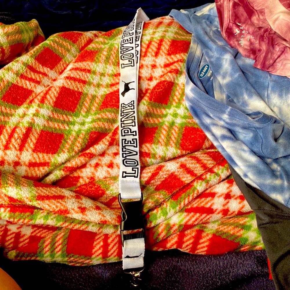 Selling a pink brand keychain!